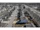 Aerial view of a neighborhood with tree-lined streets and a mix of house styles at 10725 Chenille Ct, Indianapolis, IN 46235