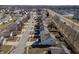 An aerial view shows well-maintained neighborhood with sidewalks and convenient street parking at 10725 Chenille Ct, Indianapolis, IN 46235