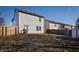 Spacious backyard offers a fenced yard with a patio and grill, great for outdoor entertaining at 10725 Chenille Ct, Indianapolis, IN 46235