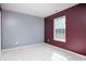 Bedroom features a large window providing natural light at 10725 Chenille Ct, Indianapolis, IN 46235