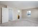 Spacious bedroom with neutral carpet and walls, with an ensuite bathroom at 10725 Chenille Ct, Indianapolis, IN 46235