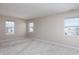 Sun-filled bedroom with three large windows offering ample natural light at 10725 Chenille Ct, Indianapolis, IN 46235