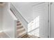 Bright entryway featuring a staircase and white door at 10725 Chenille Ct, Indianapolis, IN 46235