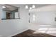 Open-concept living room with durable flooring, and bright light from many windows at 10725 Chenille Ct, Indianapolis, IN 46235