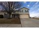 Charming two-story home featuring a spacious driveway and inviting front porch at 12486 Schoolhouse Rd, Fishers, IN 46037
