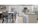 Bright eat-in kitchen featuring stainless steel appliances and sliding doors at 12486 Schoolhouse Rd, Fishers, IN 46037