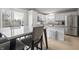 Eat-in kitchen with stainless steel appliances and an adjacent dining area at 12486 Schoolhouse Rd, Fishers, IN 46037