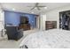 Spacious main bedroom with accent wall, walk-in closet, and furniture set at 12486 Schoolhouse Rd, Fishers, IN 46037