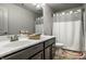 Well-maintained bathroom featuring double sinks, a vanity and a bathtub at 12624 Teaberry Ln, Carmel, IN 46032