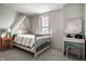 Bright bedroom with unique decor, natural light, and a vanity at 12624 Teaberry Ln, Carmel, IN 46032