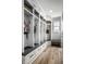 Organized mudroom featuring built-in storage cubbies, drawers, and a convenient bench at 12624 Teaberry Ln, Carmel, IN 46032