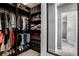 Spacious walk-in closet with custom shelving and organization system at 12624 Teaberry Ln, Carmel, IN 46032