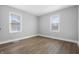 Serene bedroom featuring contemporary flooring, neutral walls and refreshing natural light at 1323 S Ewing St, Indianapolis, IN 46203