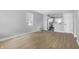A bright and airy living room with stylish floors and a seamless open-concept design at 1323 S Ewing St, Indianapolis, IN 46203