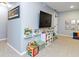 Finished basement with colorful decor, built-in shelves, and lots of play areas for  at 14055 Mimosa Ct, Fishers, IN 46038