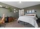 Relaxing bedroom with serene green walls, plush carpeting, and comforting natural lighting at 14055 Mimosa Ct, Fishers, IN 46038