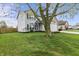 Charming two-story home with blue shutters and well-manicured lawn at 14055 Mimosa Ct, Fishers, IN 46038