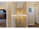 Hallway with light fixture and view of interior rooms at 14055 Mimosa Ct, Fishers, IN 46038