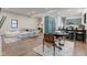 An open living space features recessed lighting, hardwood floors, and lots of natural light at 1434 S Talbott St, Indianapolis, IN 46225