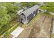 Aerial view of a two-story house with dark gray siding and a concrete driveway at 1538 Ringgold Ave, Indianapolis, IN 46203