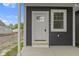 Inviting front entrance featuring a white door and complementary trim beneath a covered porch at 1538 Ringgold Ave, Indianapolis, IN 46203