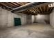 Spacious unfinished basement featuring concrete walls, exposed ceiling, and ample potential for customization at 1805 Braeburn Dr, Carmel, IN 46032