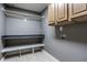 Laundry room featuring neutral colors, storage cabinets, bench and shelving, and hookups at 1805 Braeburn Dr, Carmel, IN 46032