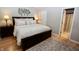 Comfortable bedroom with a large bed, bedside lamps, and modern decor at 1939 Crystal Bay E Dr, Plainfield, IN 46168
