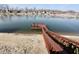 Waterfront dock extending into the lake, providing access for boating and enjoyment of the surrounding landscape at 1939 Crystal Bay E Dr, Plainfield, IN 46168