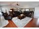 Spacious living room featuring vaulted ceilings, recessed lighting, and comfortable seating at 1939 Crystal Bay E Dr, Plainfield, IN 46168