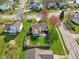 Aerial view of a suburban home with backyard, and enclosed porch at 2020 Cross Willow Ln, Indianapolis, IN 46239