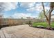 Backyard featuring a paved patio, grass area, wooden fence and landscaping at 2020 Cross Willow Ln, Indianapolis, IN 46239