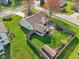 Beautiful backyard showcasing a well-kept lawn, garden, and privacy fence at 2020 Cross Willow Ln, Indianapolis, IN 46239