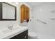 Clean bathroom featuring a vanity, mirror, and accessible shower with grab bar at 2020 Cross Willow Ln, Indianapolis, IN 46239