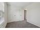 Bedroom showcasing neutral carpet, freshly painted white walls, and natural light at 2020 Cross Willow Ln, Indianapolis, IN 46239