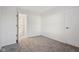Neutral carpet in bedroom, door to bathroom visible, freshly painted walls at 2020 Cross Willow Ln, Indianapolis, IN 46239