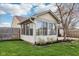 Enclosed sunroom with large windows, offering great views to the backyard at 2020 Cross Willow Ln, Indianapolis, IN 46239