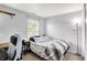 Simple bedroom with a comfortable bed and ample natural light at 2130 Crossford Way, Indianapolis, IN 46234