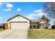 Charming single-Gathering home with attached garage, well-maintained lawn, and inviting curb appeal on a sunny day at 2130 Crossford Way, Indianapolis, IN 46234