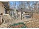 Backyard featuring a patio with a hot tub and outdoor seating area at 2165 Plantation Ln, Martinsville, IN 46151