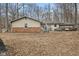 Expansive backyard featuring a patio area, mature trees, and space for outdoor enjoyment at 2165 Plantation Ln, Martinsville, IN 46151