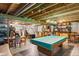Unfinished basement featuring bare concrete floors, exposed ductwork, and a pool table at 2165 Plantation Ln, Martinsville, IN 46151