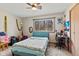 Bright bedroom with a ceiling fan, neutral walls, and soft carpeting at 2165 Plantation Ln, Martinsville, IN 46151