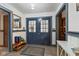Entryway featuring double doors, neutral paint colors, and vinyl flooring at 2165 Plantation Ln, Martinsville, IN 46151
