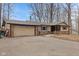 Charming home with a brick and siding facade, attached garage, and well-maintained landscaping at 2165 Plantation Ln, Martinsville, IN 46151