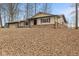 Attractive house featuring brick and siding details, complemented by a neatly maintained front yard at 2165 Plantation Ln, Martinsville, IN 46151