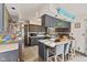 Eat in kitchen with stainless steel appliances, a breakfast bar, and attractive gray cabinets at 2165 Plantation Ln, Martinsville, IN 46151