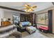 Comfortable living room with beamed ceiling, built-in bookcase, and lots of natural light at 2165 Plantation Ln, Martinsville, IN 46151