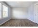 Stylish bedroom with wood floors, decorative accent wall and natural light at 2274 Finchley Rd, Carmel, IN 46032