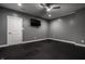Empty bedroom with cushioned flooring, ceiling fan, and natural lighting at 2274 Finchley Rd, Carmel, IN 46032